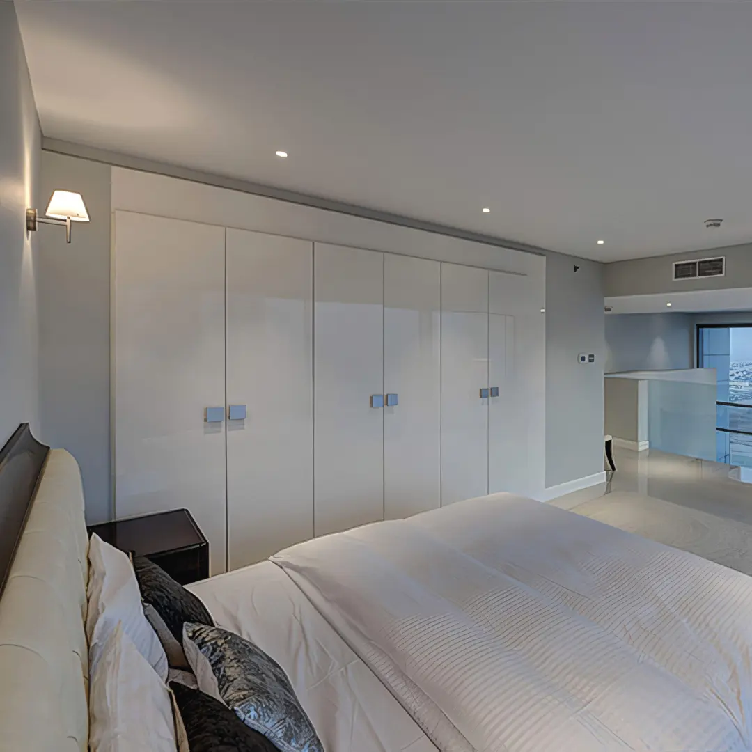 Compincar - project RDK Towers Dubai - bedroom with white cabinets